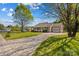 Charming single-story home with a driveway and a manicured front yard at 140 Hazelwood Dr, Rockwell, NC 28138
