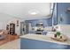 Open-concept kitchen with stainless steel appliances and adjacent living area at 140 Hazelwood Dr, Rockwell, NC 28138