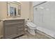 Bathroom with modern vanity and walk-in shower at 14010 Promenade Dr, Huntersville, NC 28078