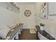 Charming mudroom boasts built-in bench seating, storage shelves, and stylish wall decor at 14010 Promenade Dr, Huntersville, NC 28078