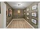 Golf themed room with decorative wood paneling at 14010 Promenade Dr, Huntersville, NC 28078