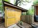 Wooden shed with a sliding door at 1408 Wicker Dr, Charlotte, NC 28210