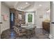 Luxurious bathroom showcasing a stone-encased tub, elegant fixtures, and a well-lit vanity area at 14130 Lea Point Ct, Huntersville, NC 28078
