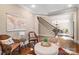 Living room with hardwood floors, natural light, and sophisticated decor at 14130 Lea Point Ct, Huntersville, NC 28078
