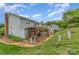 View of back yard with deck and pergola with connection to the home at 1424 River Dr, Belmont, NC 28012