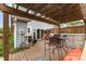 Charming deck with pergola and patio furniture, ideal for outdoor dining and relaxing at 1424 River Dr, Belmont, NC 28012