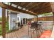 Charming deck with pergola and patio furniture, ideal for outdoor dining and relaxing at 1424 River Dr, Belmont, NC 28012