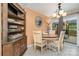 Sun-filled dining area with sliding door access at 1424 River Dr, Belmont, NC 28012