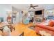 Inviting living room with seating and views of the stairs and kitchen at 1424 River Dr, Belmont, NC 28012