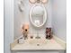 Charming powder room with a decorative mirror, vanity, stylish lighting, and neutral color scheme at 1424 River Dr, Belmont, NC 28012