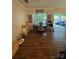 Bright dining area with a round table, wood floors, and sliding doors to the patio at 15003 Jerpoint Abby Dr, Charlotte, NC 28273