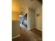 Upstairs hallway with a carpeted floor, closet and access to other rooms at 15003 Jerpoint Abby Dr, Charlotte, NC 28273