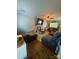 Comfortable living room featuring plush seating, a fireplace, and an open layout at 15003 Jerpoint Abby Dr, Charlotte, NC 28273