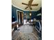 Well-lit home office featuring dual desks, stylish decor, and a comfortable work environment at 15003 Jerpoint Abby Dr, Charlotte, NC 28273