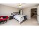 Comfortable bedroom featuring a ceiling fan, string lights, and a cozy seating area at 1524 Court Cir, Newton, NC 28658