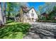 View of a home's exterior featuring a two-car garage and stone and siding accents at 1524 Court Cir, Newton, NC 28658