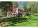Side view of home with two car garage and a fenced in yard at 1524 Court Cir, Newton, NC 28658