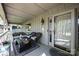 Charming covered front porch with seating area, offering a welcoming and comfortable outdoor space at 1524 Court Cir, Newton, NC 28658