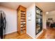 Eat-in kitchen with custom wood shelving, a pantry, and hardwood flooring at 1524 Court Cir, Newton, NC 28658