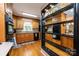 Charming kitchen featuring wood cabinetry, hardwood floors, and granite countertops at 1524 Court Cir, Newton, NC 28658