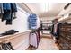 Large walk-in closet with ample shelving, hanging space, and hardwood floors at 1524 Court Cir, Newton, NC 28658