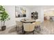 Game room with space for playing cards, features a modern aesthetic with neutral furniture at 15906 Youngblood Rd, Charlotte, NC 28278