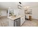 Bright and airy kitchen with a center island, modern appliances, and an adjacent dining area at 15906 Youngblood Rd, Charlotte, NC 28278