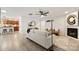 Open-concept living room flows into the kitchen, offering a welcoming space for Gathering and friends at 15906 Youngblood Rd, Charlotte, NC 28278