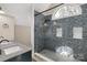 Elegant bathroom featuring a uniquely tiled shower and a modern sink at 16 Catawba Ridge Ct, Clover, SC 29710