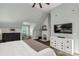 Large bedroom offers a fireplace, accent wall, hardwood floors, and plentiful lighting to make this space cozy at 16 Catawba Ridge Ct, Clover, SC 29710