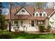 Inviting home featuring a covered porch, well-kept lawn and stone walkway at 16 Catawba Ridge Ct, Clover, SC 29710