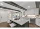 Modern kitchen with a large island, white cabinets, and stainless steel appliances at 16 Catawba Ridge Ct, Clover, SC 29710