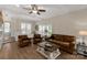 Inviting living room features hardwood floors, a window seat, and comfortable seating around a coffee table at 16 Catawba Ridge Ct, Clover, SC 29710