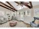 Bright sunroom with a vaulted ceiling, exposed beams and lots of natural light at 16 Catawba Ridge Ct, Clover, SC 29710
