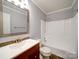 Cozy bathroom with white shower and toilet with light gray walls at 16149 Haroa Ct, Tega Cay, SC 29708
