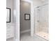 Bathroom featuring a glass shower and stylish fixtures at 19034 Cypress Garden Dr, Davidson, NC 28036