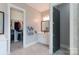 Bathroom with double vanity and walk-in closet at 19034 Cypress Garden Dr, Davidson, NC 28036