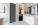 Bathroom view, showing the vanity and doorway to the bedroom at 19034 Cypress Garden Dr, Davidson, NC 28036