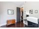 Bedroom with desk and door leading into the bathroom at 19034 Cypress Garden Dr, Davidson, NC 28036