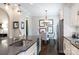 Charming breakfast nook with a round table, chandelier, and view of the backyard at 19034 Cypress Garden Dr, Davidson, NC 28036