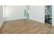 Spacious bedroom with hardwood floors and access to a sunroom and a bathroom at 2008 Plain Field Dr, Bessemer City, NC 28016