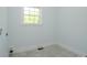 Laundry room featuring tile floors and a window at 2008 Plain Field Dr, Bessemer City, NC 28016