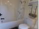 Clean bathroom featuring tub and shower combination with a modern shower curtain at 202 S Love Chapel Rd, Stanfield, NC 28163