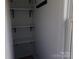 A well-organized closet with multiple shelves offering ample storage at 202 S Love Chapel Rd, Stanfield, NC 28163