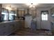 Updated kitchen with sleek countertops, modern fixtures, and warm, inviting decor at 202 S Love Chapel Rd, Stanfield, NC 28163