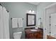 Bathroom featuring granite sink, decorative mirror, vanity, and tile flooring at 208 Grasshopper Cir, Mooresville, NC 28117