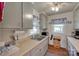 Functional kitchen equipped with modern appliances, wooden countertops, and ample cabinet storage at 220 Tomberlin Rd, Mount Holly, NC 28120