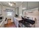Kitchen featuring stainless steel appliances, wooden countertops, plenty of storage, and an efficient layout at 220 Tomberlin Rd, Mount Holly, NC 28120