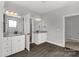 Modern bathroom featuring double vanities and granite countertops at 2212 University Dr, Lancaster, SC 29720