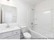 Well-lit bathroom includes a shower-tub combo, modern fixtures, and a vanity at 24558 Blue Heron Cir # 402, Lancaster, SC 29720